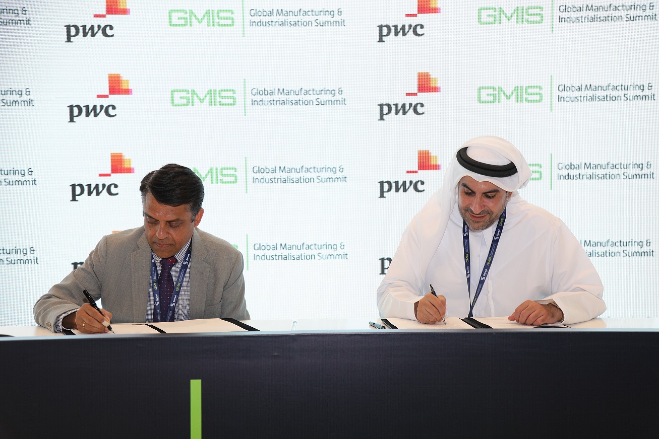 Badr Al Olama, head of the GMIS organising Committee and Anil Khurana, Global Industrial Manufacturing & Automotive Leader of PwC, sign a Memorandum of Understanding on Monday (Photo courtesy of GMIT) 